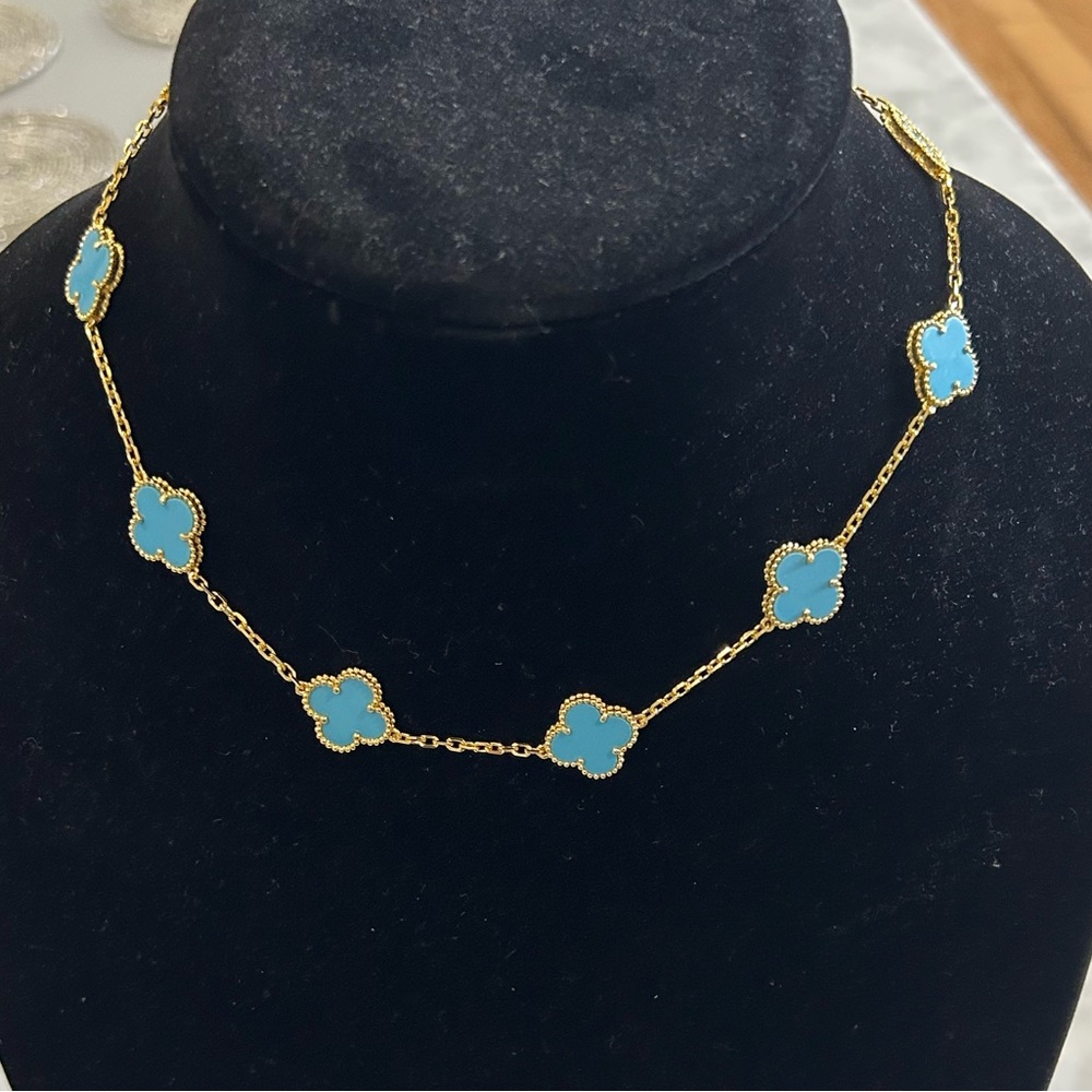 Turquoise and yellow gold 10 motif necklace